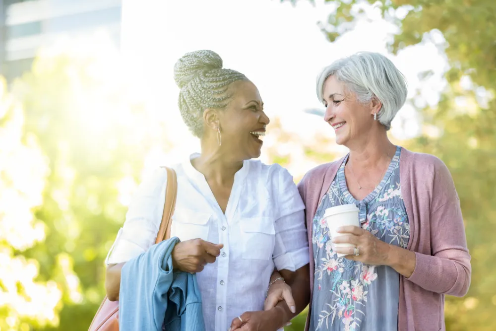 A senior patient chatting with her doctor