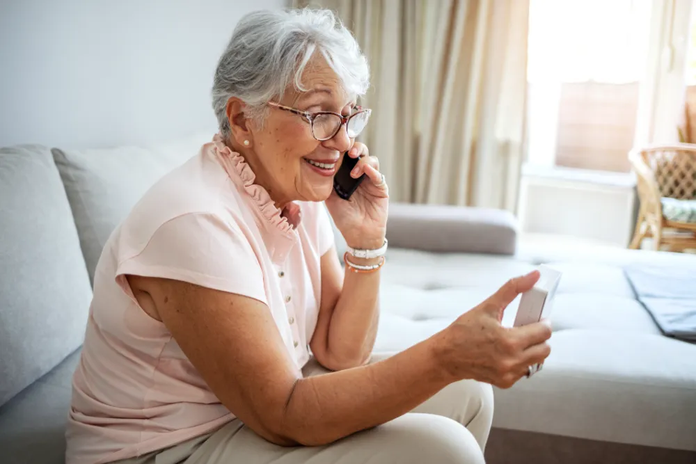 A doctor reviewing medications with a senior